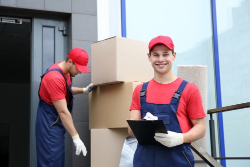Moving boxes and furniture during a Notting Hill removal