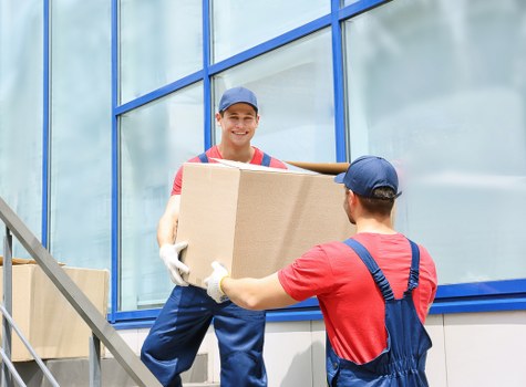 Safe removals team managing items with planning and care