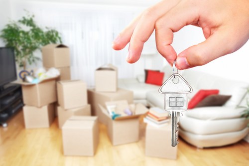 Furniture and packed boxes being arranged inside a removal van