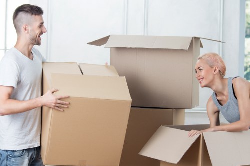 Packed boxes and furniture ready for a local home move in Notting Hill