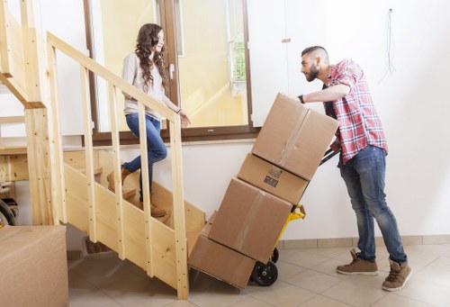 Packed moving boxes and household items ready for transport