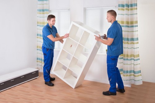 Loading furniture for a small home move in West London