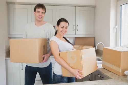 Boxes, wrapping supplies, and organised moving preparation for a West London property